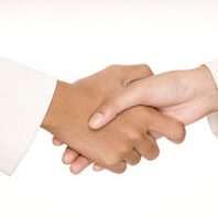 Agreeing to sell with handshake.
